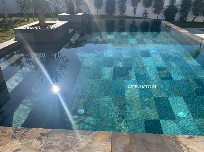 Trouver un carrelage imitation pierre de bali pour piscine